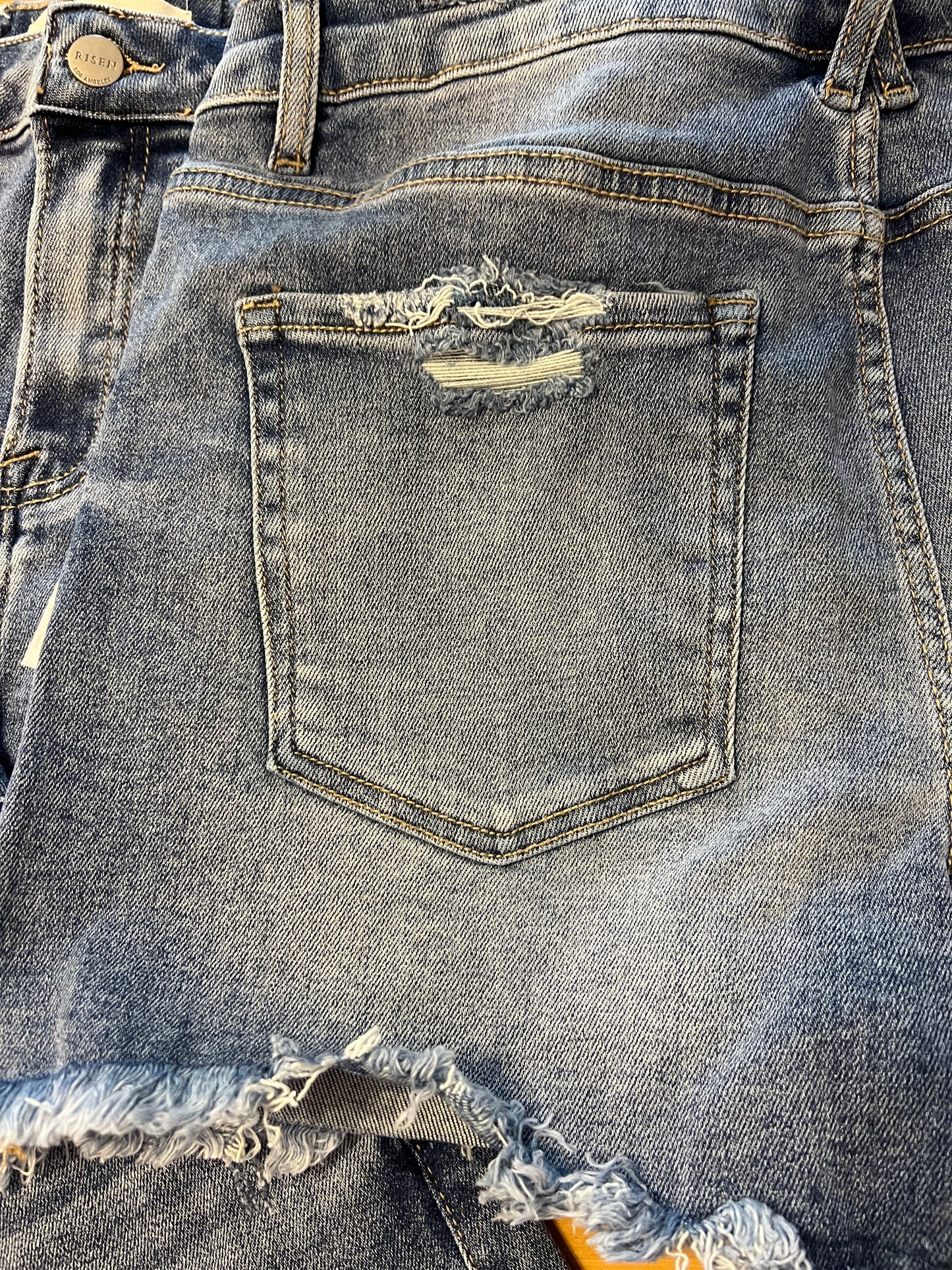 Mid Rise Distressed Jean Shorts